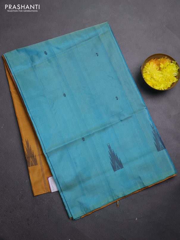 Banana pith saree teal blue and mustard shade with thread woven buttas in borderless style