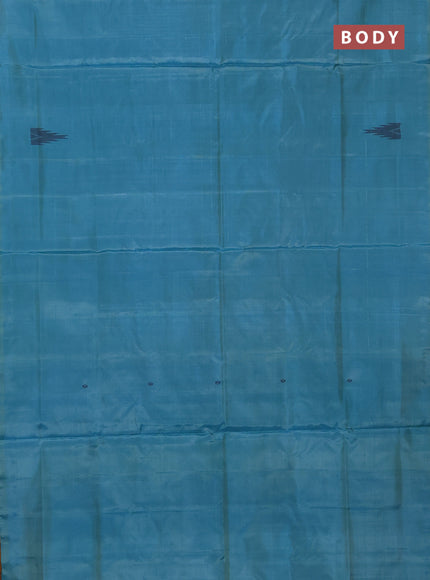 Banana pith saree teal blue and mustard shade with thread woven buttas in borderless style