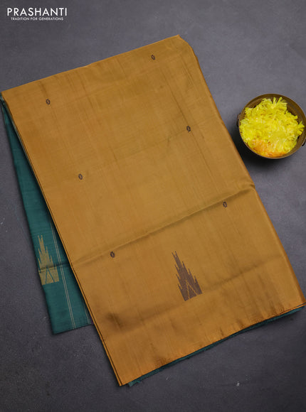 Banana pith saree mustard and peacock green with thread woven buttas in borderless style