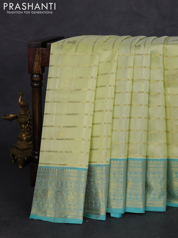 Venkatagiri silk saree mild pista green and teal blue shade with allover zari checks & buttas and rich zari woven border