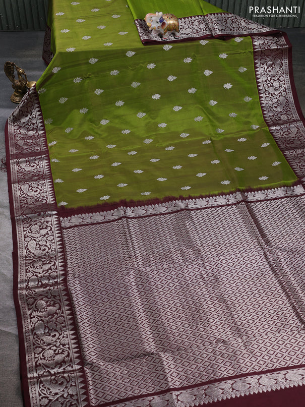 Venkatagiri silk saree mehendi green and coffee brown with silver zari woven buttas and peacock silver zari woven border