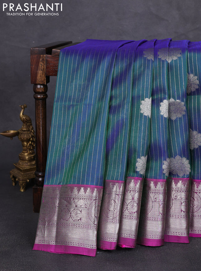 Venkatagiri silk saree dual shade of bluish green and magenta pink with allover silver zari weaves & buttas and silver zari woven border
