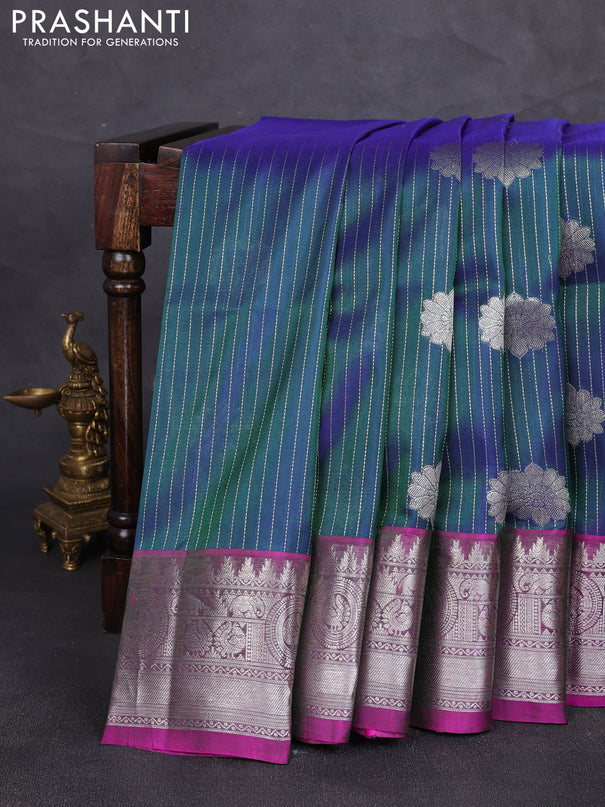 Venkatagiri silk saree dual shade of bluish green and magenta pink with allover silver zari weaves & buttas and silver zari woven border