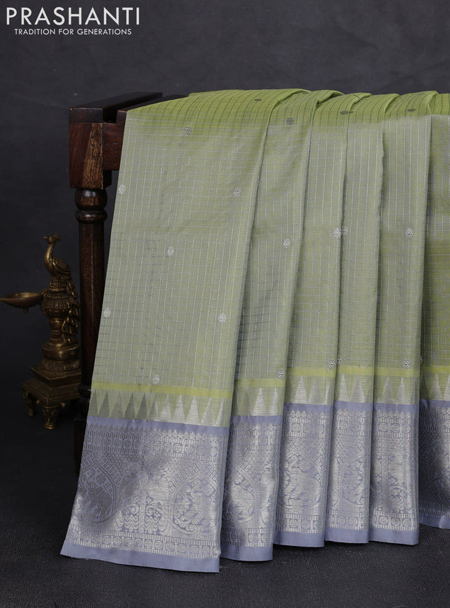 Venkatagiri silk saree pista green and grey with allover silver zari checks & buttas and temple silver zari woven border