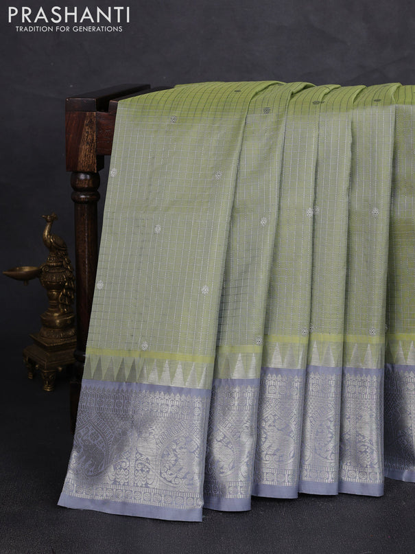 Venkatagiri silk saree pista green and grey with allover silver zari checks & buttas and temple silver zari woven border