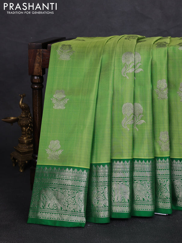Venkatagiri silk saree light green and green with allover silver zari woven buttas and silver zari woven border