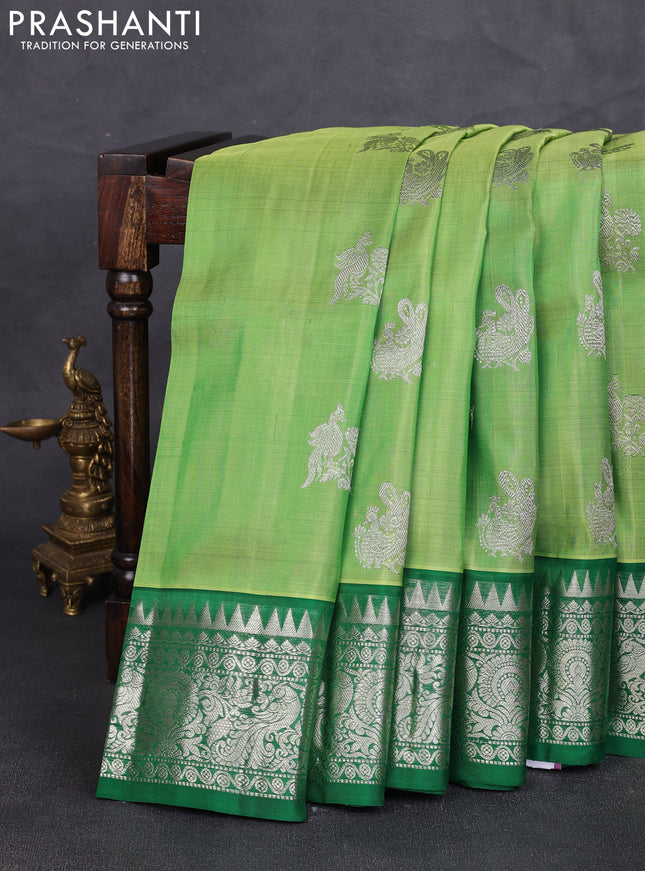 Venkatagiri silk saree light green and green with allover silver zari woven buttas and silver zari woven border