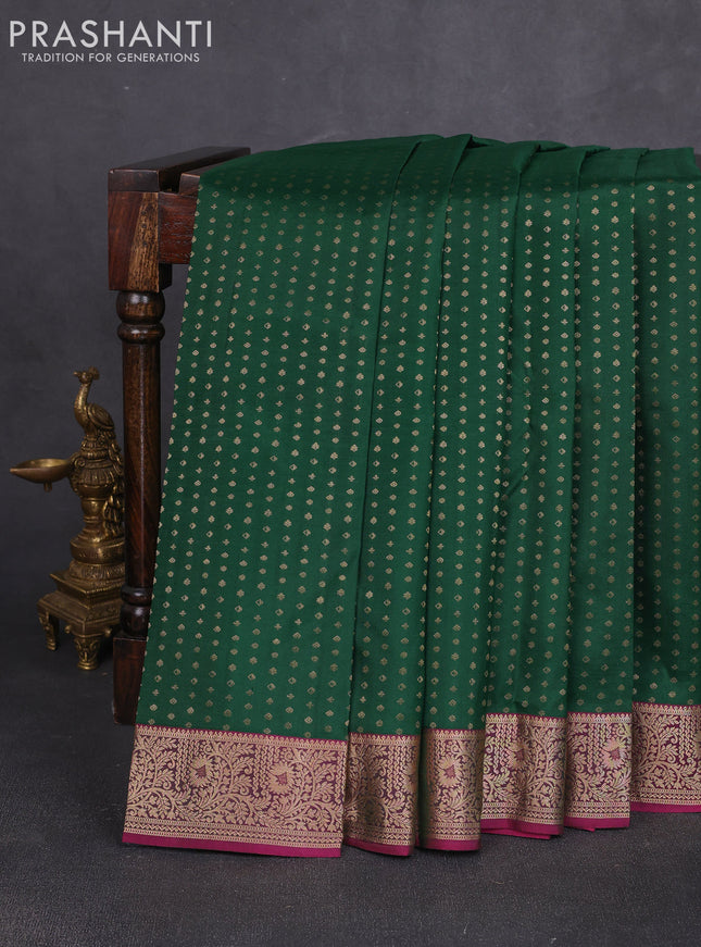Pure kanchipuram silk saree bottle green and magenta pink with allover zari woven 1000 buttas and zari woven border