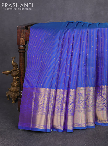 Pure kanchipuram silk saree blue with allover stripe zari woven 1000 buttas and long zari woven border