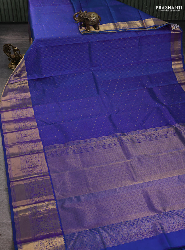 Pure kanchipuram silk saree blue with allover stripe zari woven 1000 buttas and long zari woven border