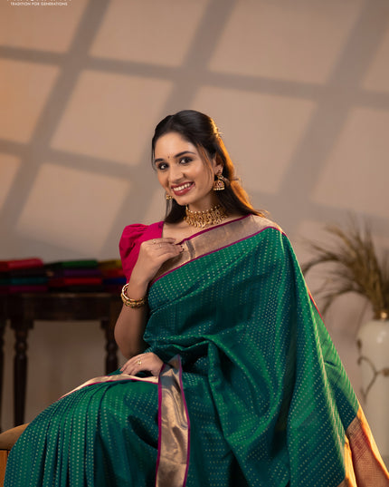 Pure kanchipuram silk saree bottle green and magenta pink with allover zari woven 1000 buttas and zari woven border