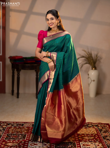 Pure kanchipuram silk saree bottle green and magenta pink with allover zari woven 1000 buttas and zari woven border