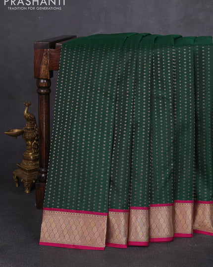 Pure kanchipuram silk saree bottle green and magenta pink with allover zari woven 1000 buttas and zari woven border