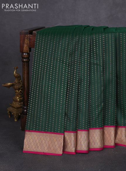 Pure kanchipuram silk saree bottle green and magenta pink with allover zari woven 1000 buttas and zari woven border