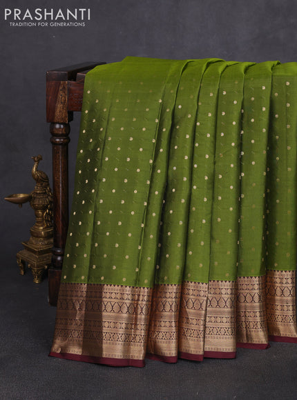 Pure kanchipuram silk saree mehendi green and coffee brown with allover zari woven 1000 buttas and zari woven border