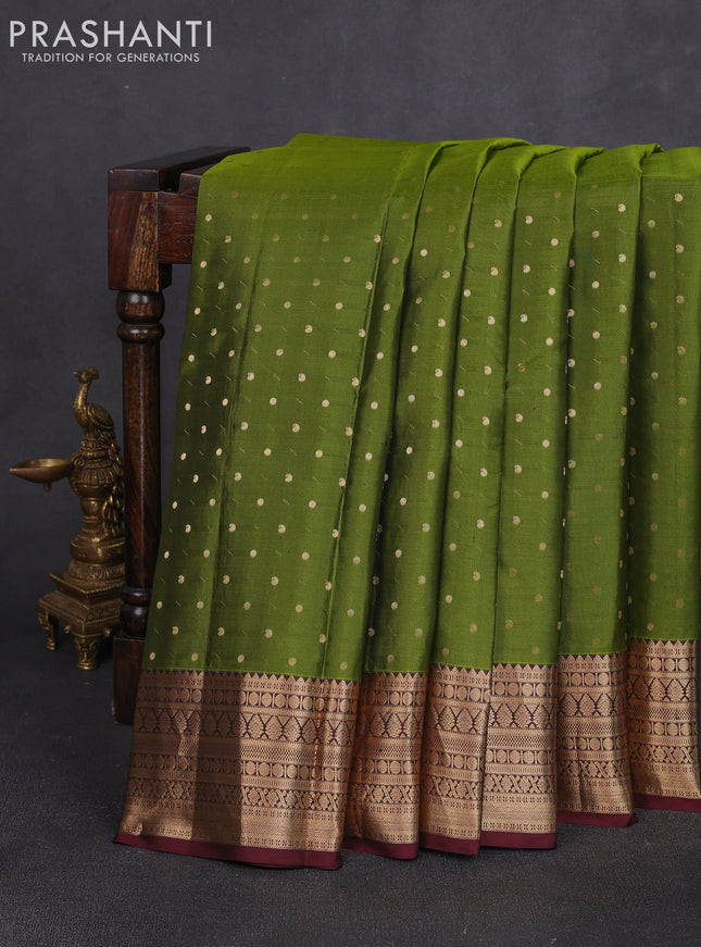 Pure kanchipuram silk saree mehendi green and coffee brown with allover zari woven 1000 buttas and zari woven border
