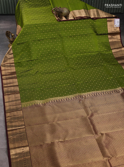 Pure kanchipuram silk saree mehendi green and coffee brown with allover zari woven 1000 buttas and zari woven border