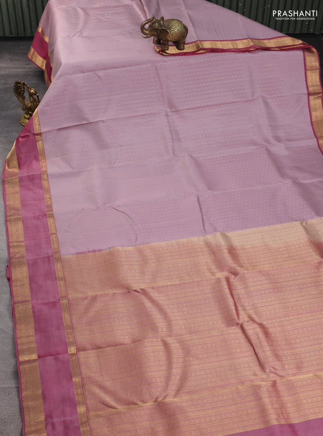 Pure kanchipuram silk saree rosy brown and magenta pink with allover zari woven 1000 buttas and rettapet zari woven border