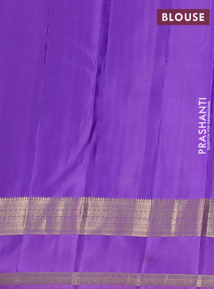 Pure kanchipuram silk saree dual shade of bluish green and lavender with allover zari woven 1000 buttas and rettapet zari woven border