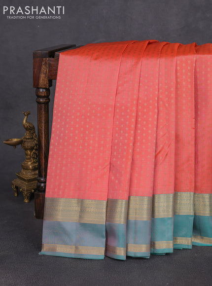 Pure kanchipuram silk saree peach shade and teal green with allover zari woven 1000 buttas and rettapet zari woven border