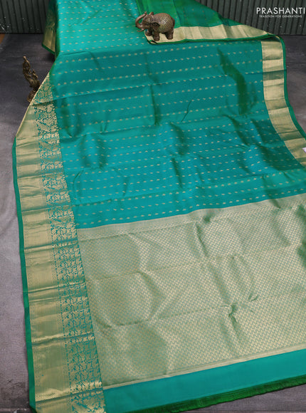 Pure kanchipuram silk saree green with allover zari woven 1000 buttas and long zari woven buttas