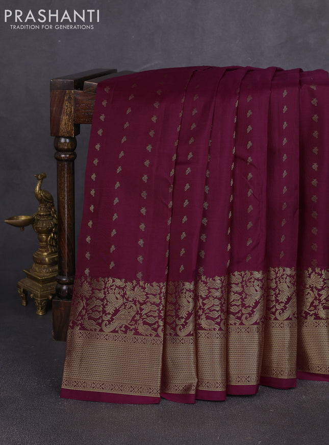 Pure kanchipuram silk saree wine shade with allover zari woven 1000 buttas and long zari woven border