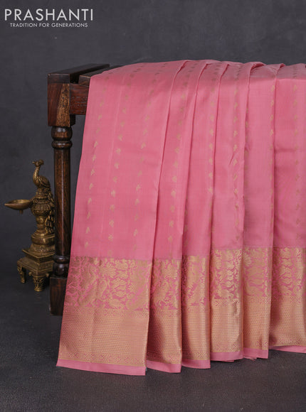 Pure kanchipuram silk saree mild peach pink with allover zari woven 1000 buttas and long zari woven border