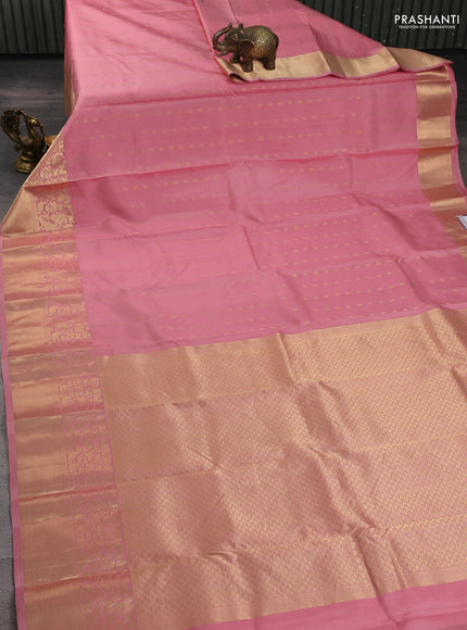 Pure kanchipuram silk saree mild peach pink with allover zari woven 1000 buttas and long zari woven border