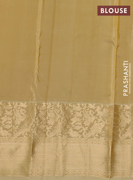 Pure kanchipuram silk saree beige with allover zari woven 1000 buttas and long zari woven border