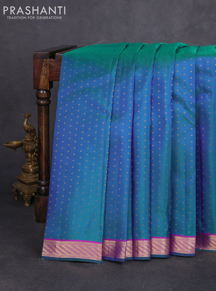 Pure kanchipuram silk saree dual shade of bluish green and pink with allover zari woven 1000 buttas and small zari woven border