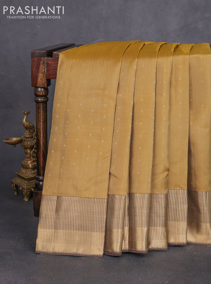 Pure kanchipuram silk saree mustard green and pink with allover zari woven 1000 buttas and zari woven border