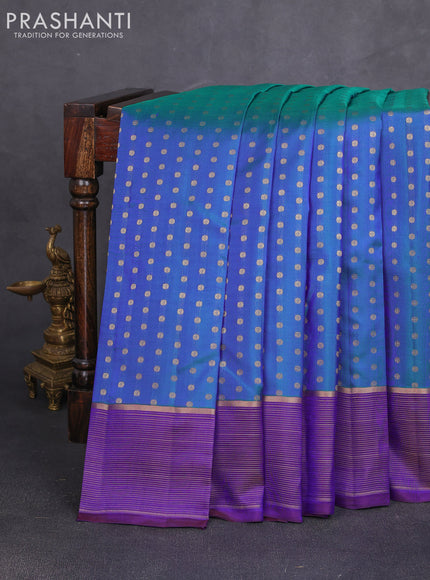 Pure kanchipuram silk saree dual shade of bluish green and violet with allover zari woven 1000 buttas and zari woven border