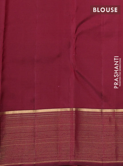 Pure kanchipuram silk saree maroon and deep wine with allover zari woven 1000 buttas and zari woven border