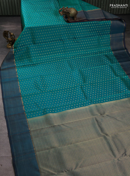 Pure kanchipuram silk saree green and teal blue with allover zari woven 1000 buttas and zari woven border