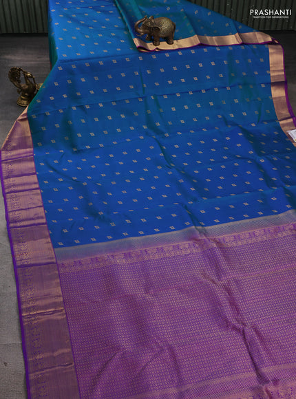 Pure kanchipuram silk saree dual shade of bluish green and purple with allover zari woven 1000 buttas and rettapet zari woven border
