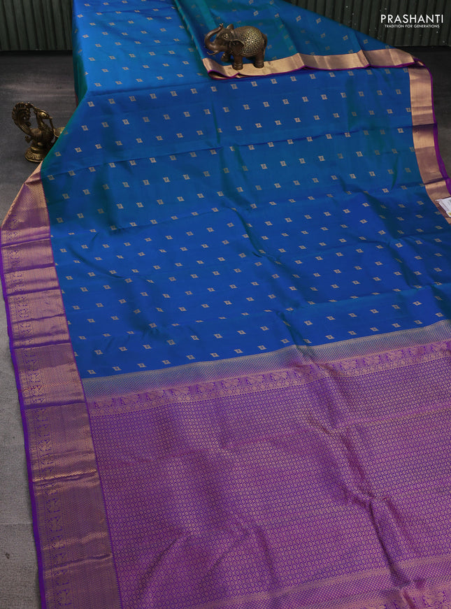 Pure kanchipuram silk saree dual shade of bluish green and purple with allover zari woven 1000 buttas and rettapet zari woven border