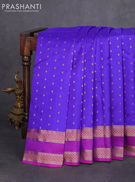 Pure kanchipuram silk saree royal blue and magenta pink with allover zari woven 1000 buttas and rettapet zari woven border