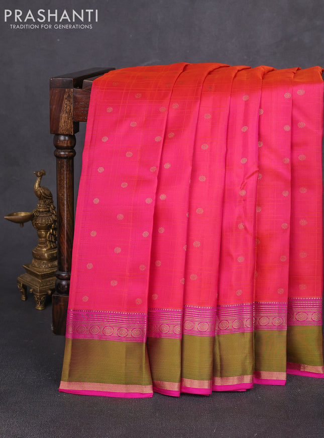 Pure kanchipuram silk saree dual shade of pinkish orange with allover checks & zari woven 1000 buttas and rettapet zari woven border