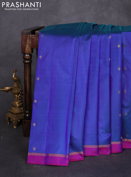 Pure kanchipuram silk saree dual shade of bluish pink and pink with allover zari woven buttas and small zari woven simple border