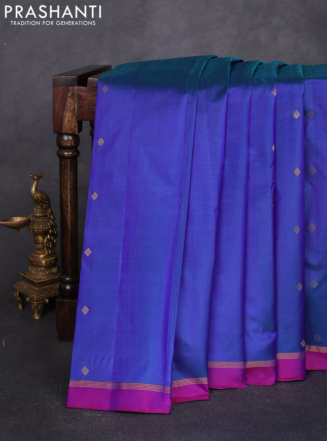 Pure kanchipuram silk saree dual shade of bluish pink and pink with allover zari woven buttas and small zari woven simple border