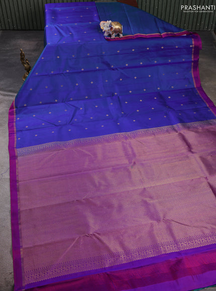 Pure kanchipuram silk saree dual shade of bluish pink and pink with allover zari woven buttas and small zari woven simple border