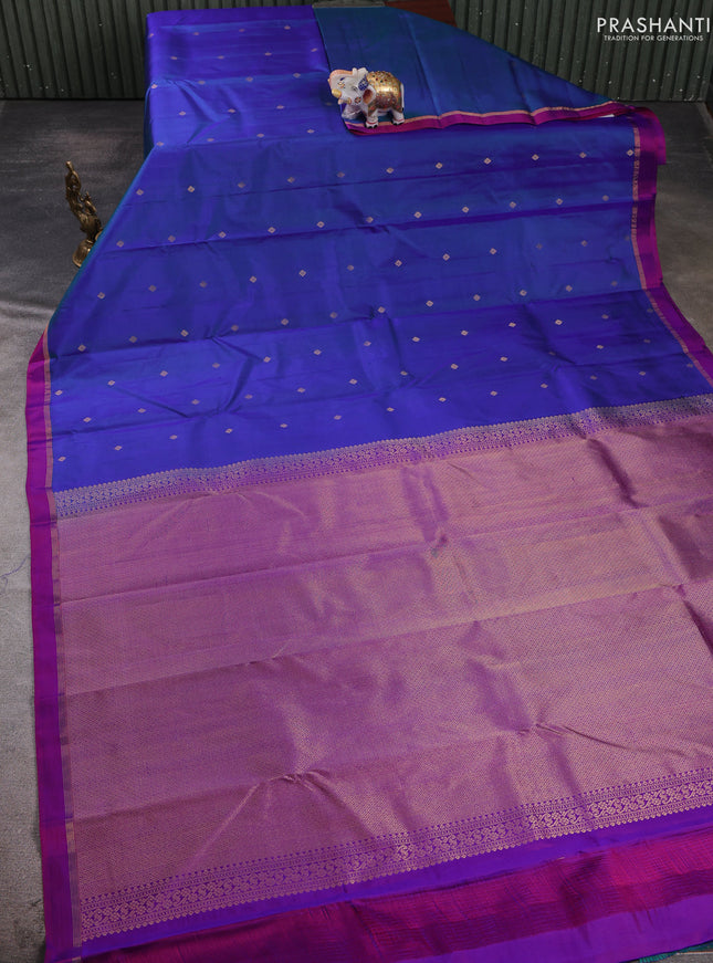Pure kanchipuram silk saree dual shade of bluish pink and pink with allover zari woven buttas and small zari woven simple border