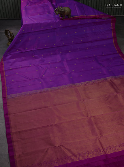 Pure kanchipuram silk saree purple and pink with allover zari woven buttas and small zari woven simple border