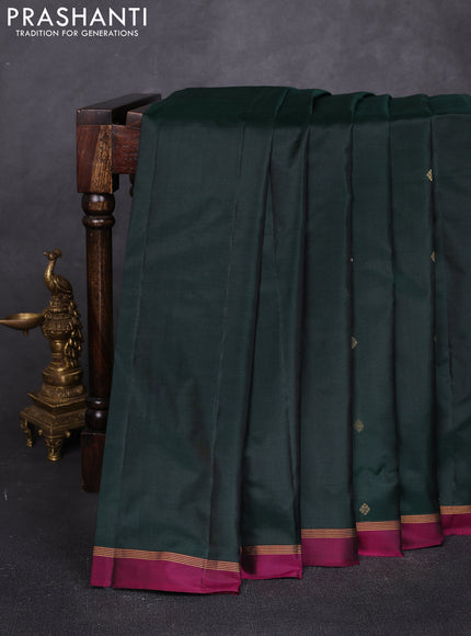 Pure kanchipuram silk saree bottle green and magenta pink with allover zari woven buttas and small zari woven simple border