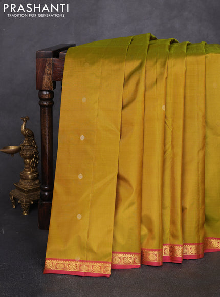 Pure kanchipuram silk saree mehendi green and pink with allover zari woven buttas and small zari woven border