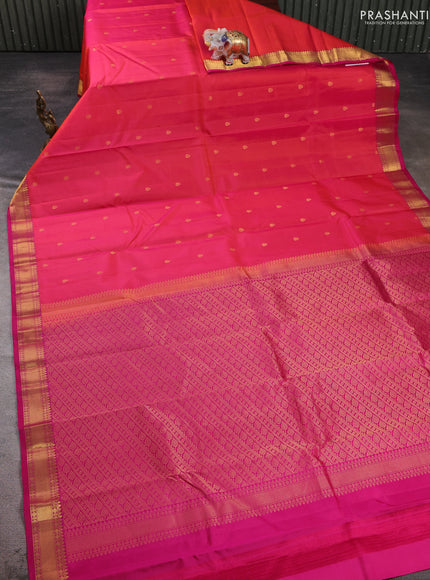 Pure kanchipuram silk saree dual shade of pinkish orange and pink with allover zari woven buttas and small zari woven border