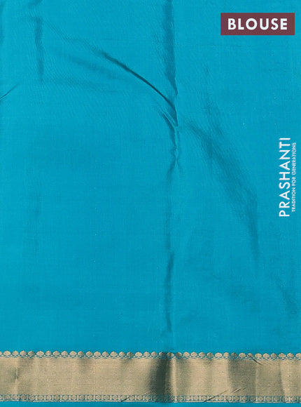 Pure kanchipuram silk saree dual shade of greenish yellow and teal green with allover zari woven buttas and small zari woven border