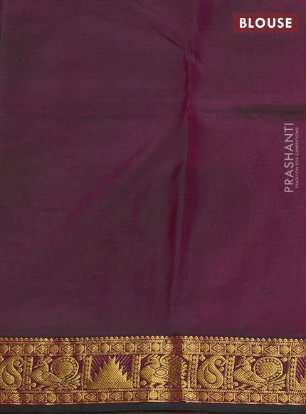 Pure kanchipuram silk saree dual shade of pinkish orange and green with allover zari woven buttas and small zari woven border