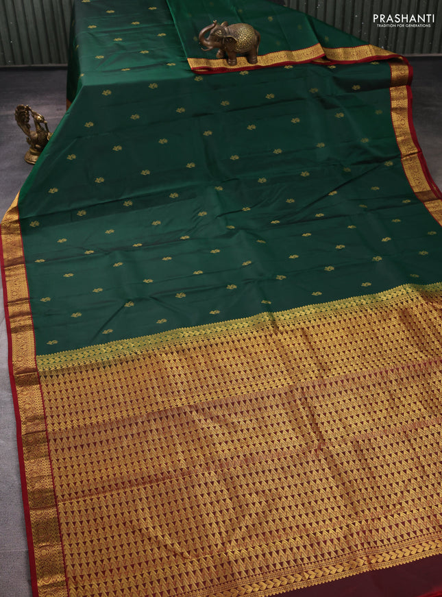 Pure kanchipuram silk saree bottle green and maroon with allover zari woven buttas and small zari woven border
