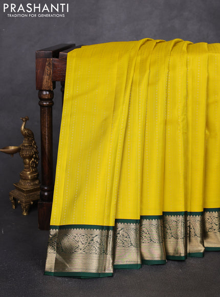 Pure kanchipuram silk saree lime green and green with allover zari stripes & zari woven 1000buttas and zari woven korvai border